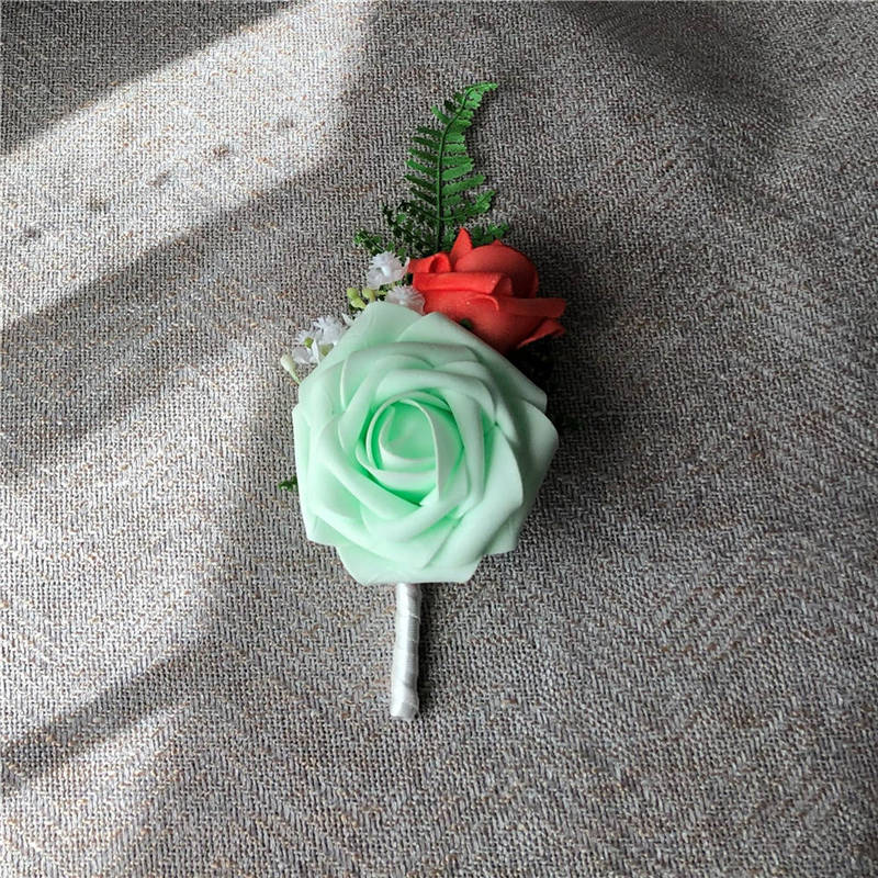 VANRINA mint and coral boutonniere